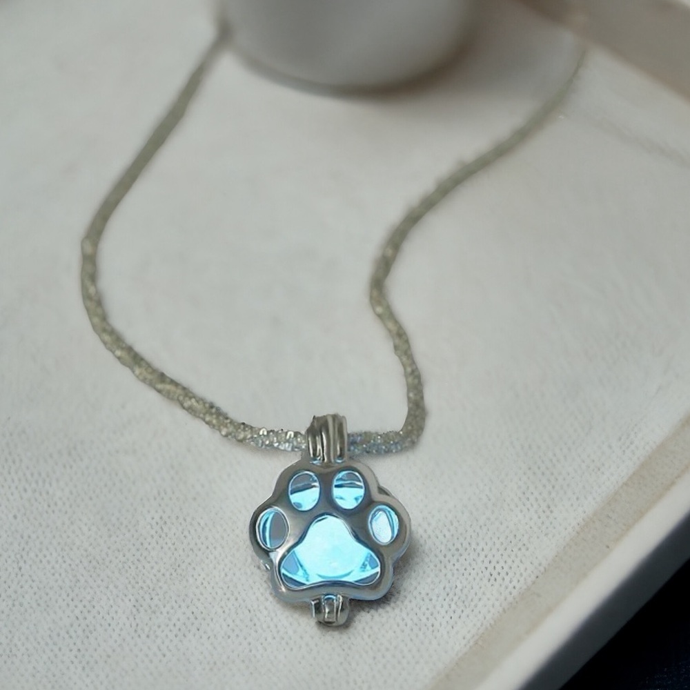 Silver Plated Glow in the dark dog paw charm necklace. New